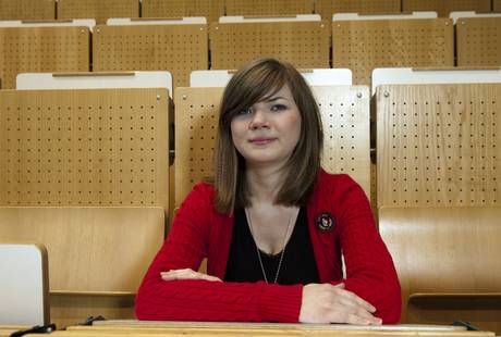 A student sits in the Audimax