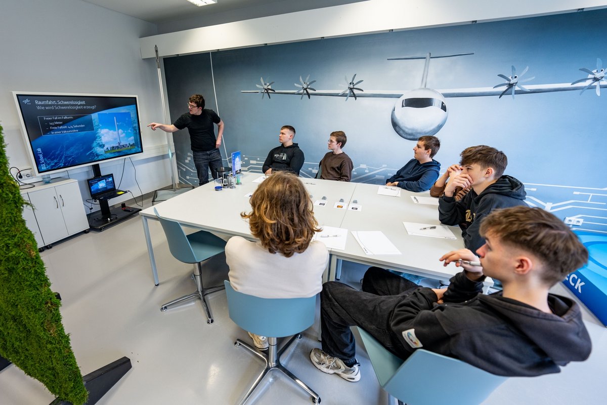 Pupils learn about weightlessness in a lecture.