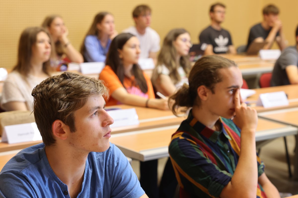 Students, sitting in a seminar room, follow a lecture at the BTU. Photo: Steffen Rasche