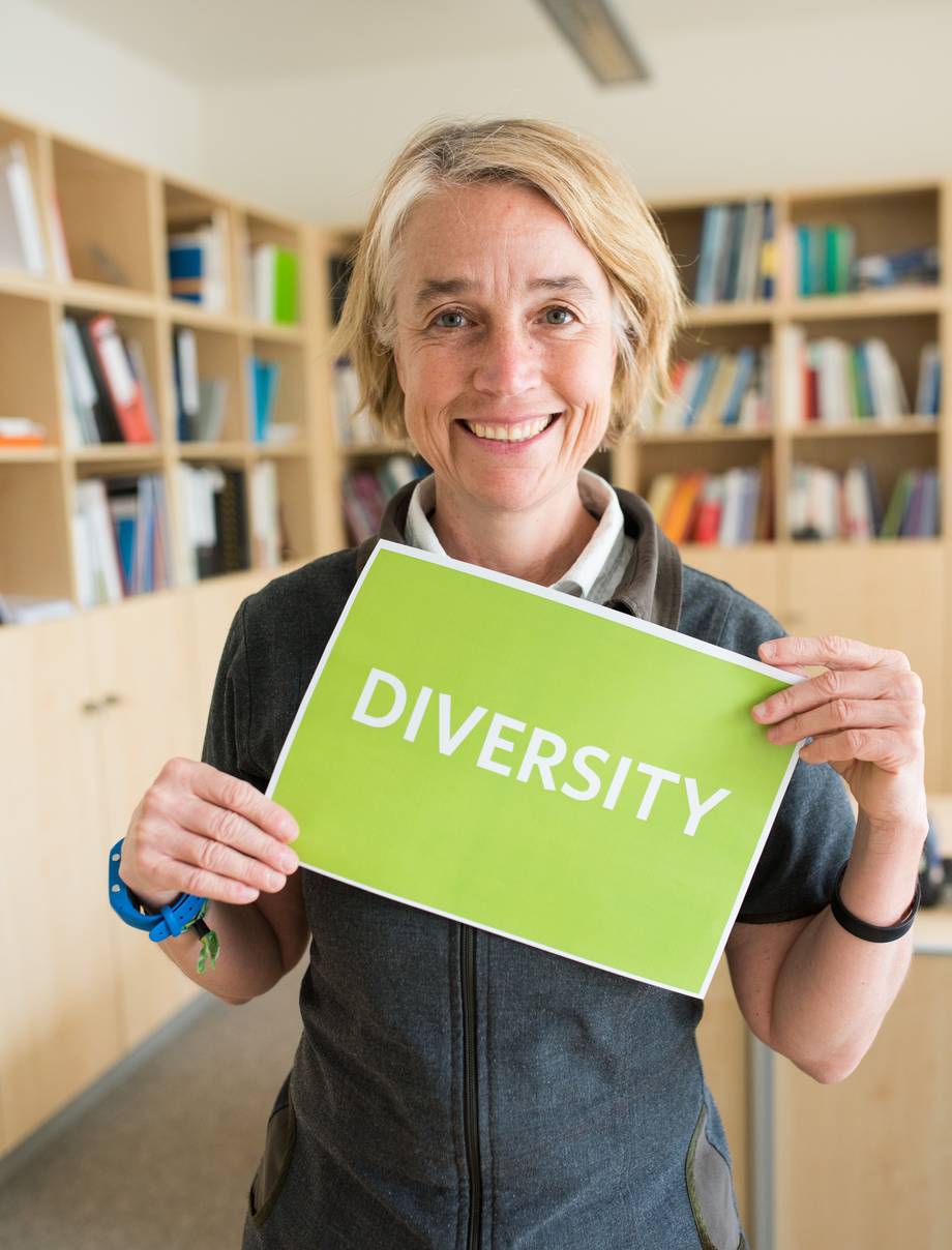 Acting President Christiane Hipp advocates diversity Acting President Christiane Hipp with a diversity sign
