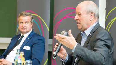 Panel discussion, Jens Krause (Cottbus Chamber of Industry and Commerce), Fred Mahro (Mayor of Guben)