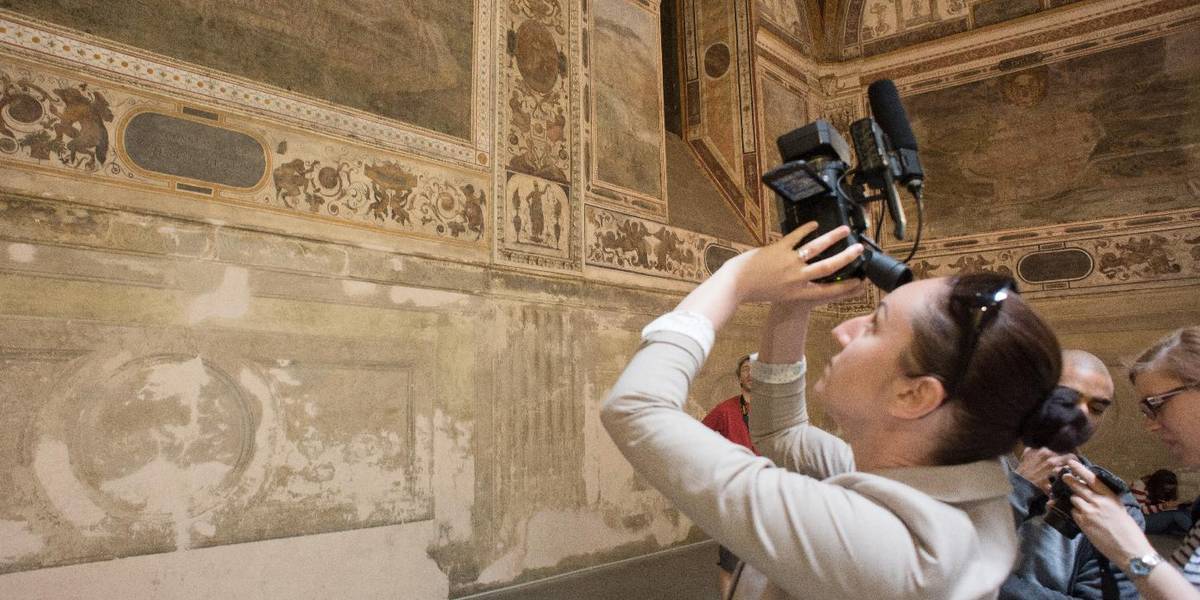 Doctoral students in the Heritage Studies programme examine antique murals