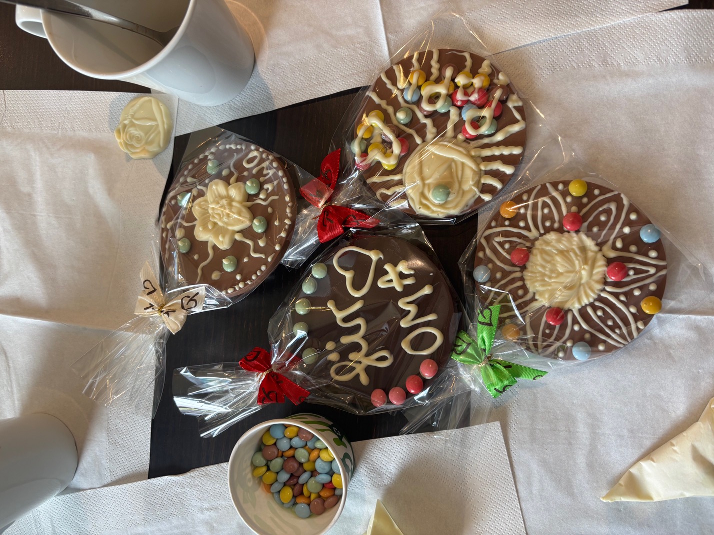 decorated chocolate coins on the table