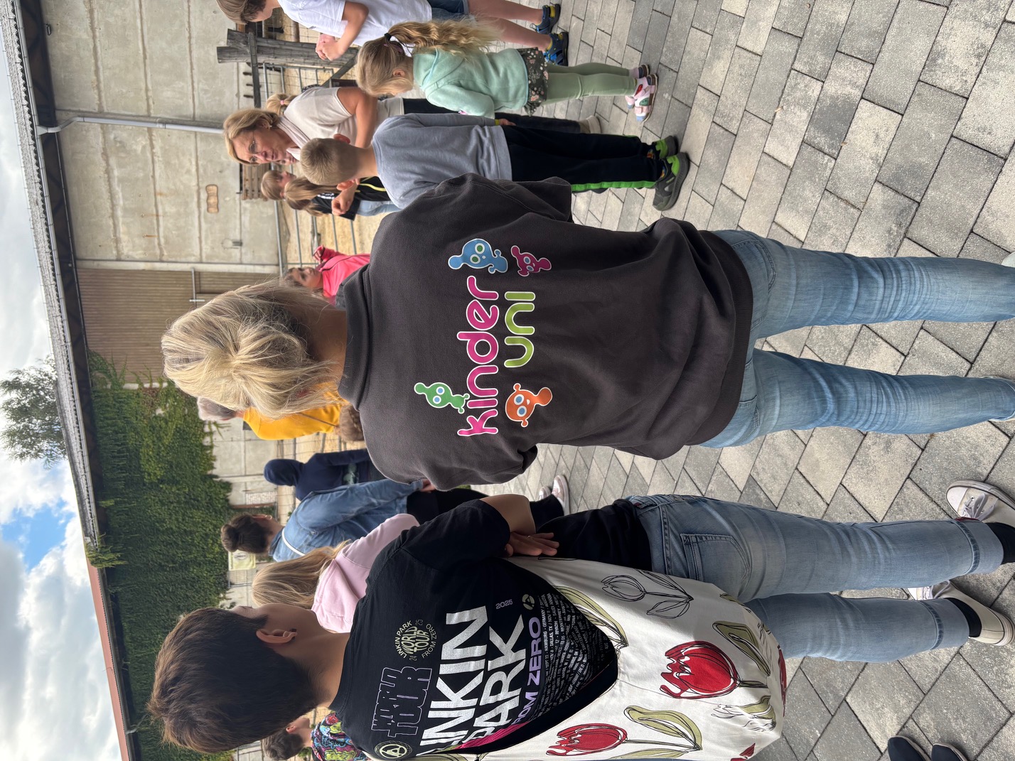 Carers with the KinderCampus logo on the back of their jackets
