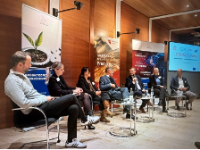 panel discussion on stage with seated people