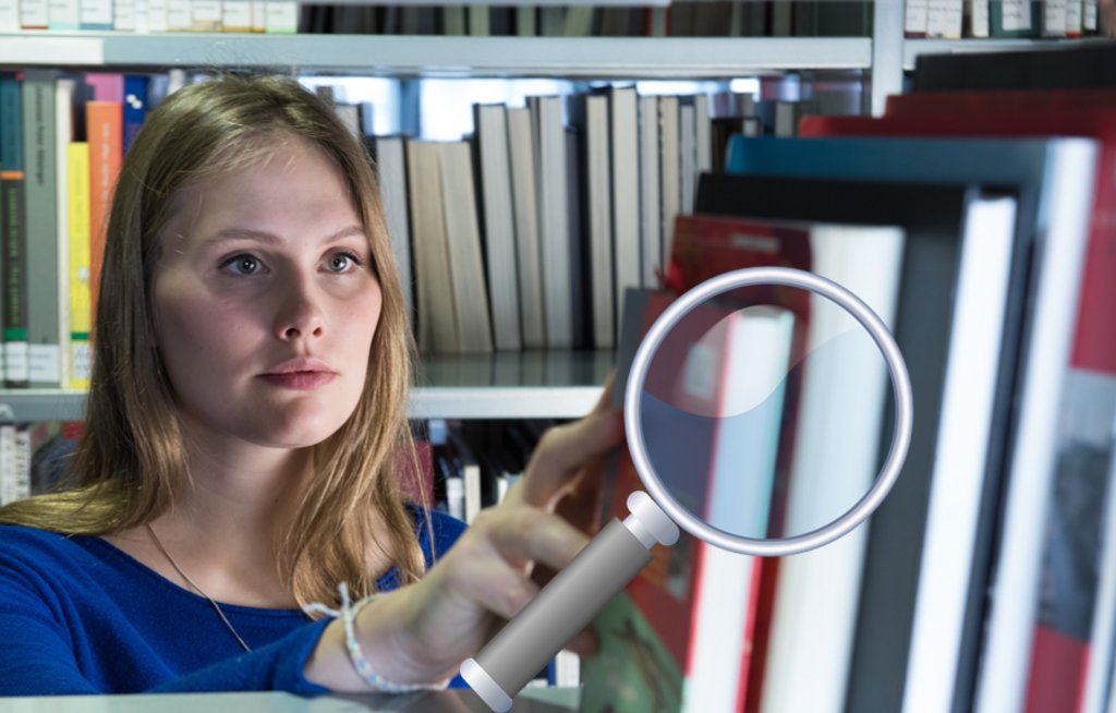 Library rallye Young woman with magnifying glass in search of literature.