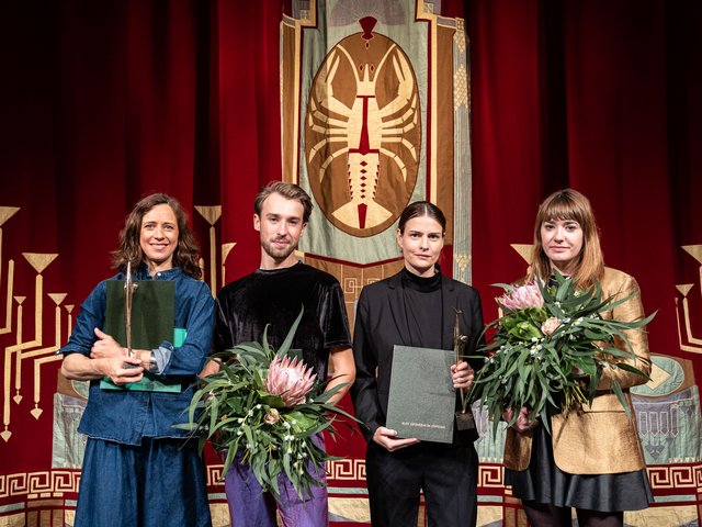 Group picture after the award ceremony on the stage of the State Theater