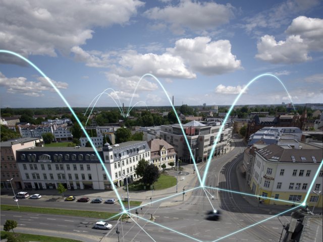 Fotomontage der Stadtansicht Cottbus mit einem digitalen Netz