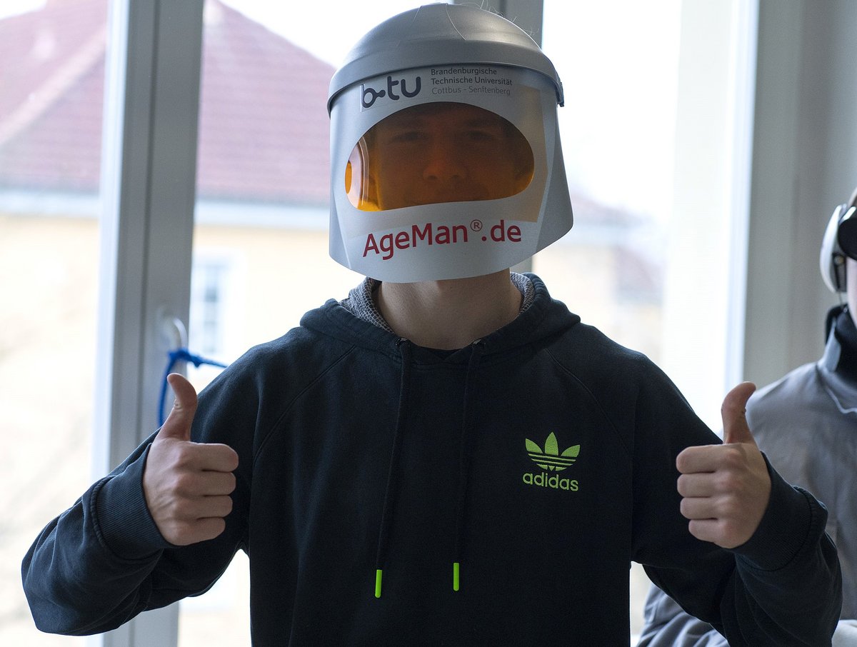 Pupils in age research suits.