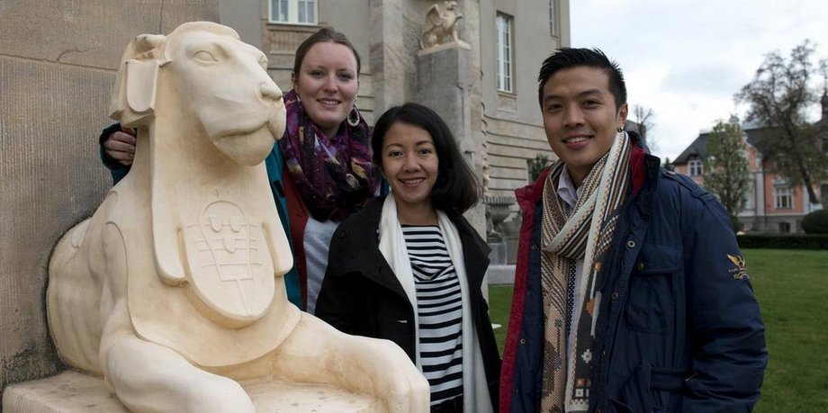 Students of different nations in front of the State Theatre in Cottbus