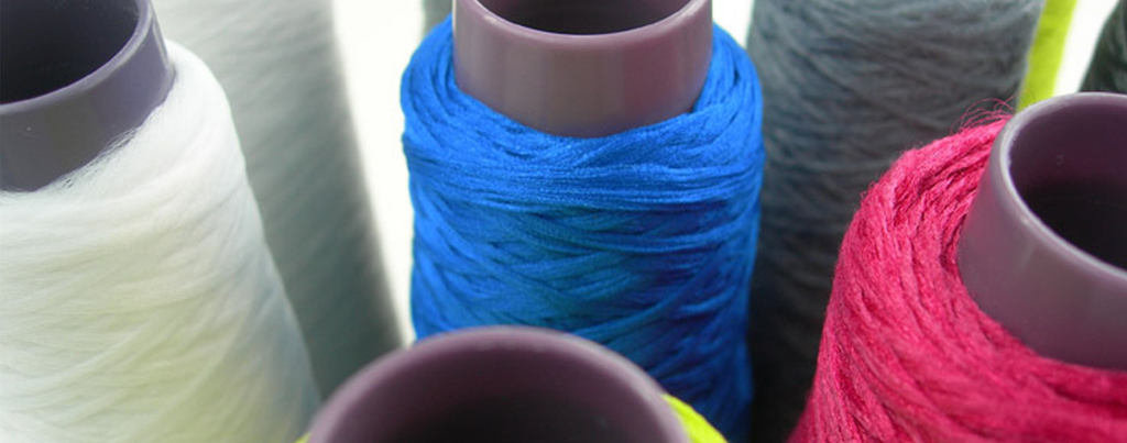 Visually, polyester fibers on a spool hardly differ from normal threads.