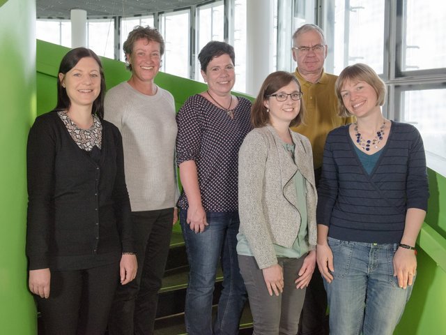 Unsere Fachreferenten im IKMZ auf der Wendeltreppe.
