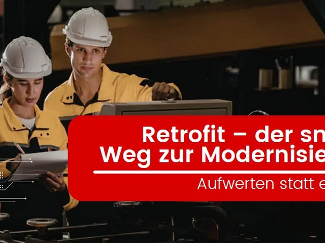 Arbeitende Menschen schauen auf einen Bildschirm