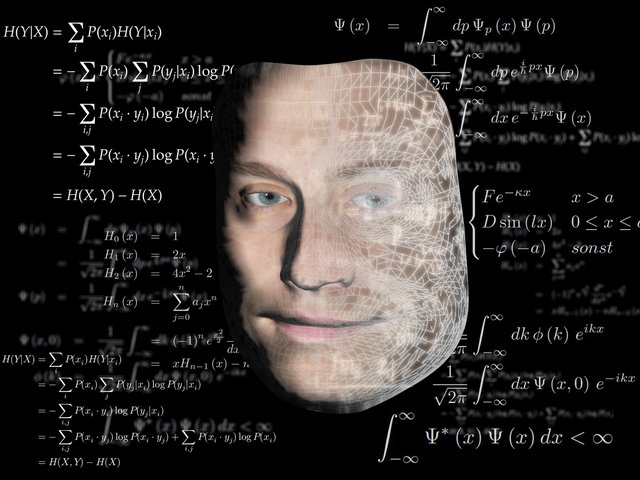 Computer face with formulas.