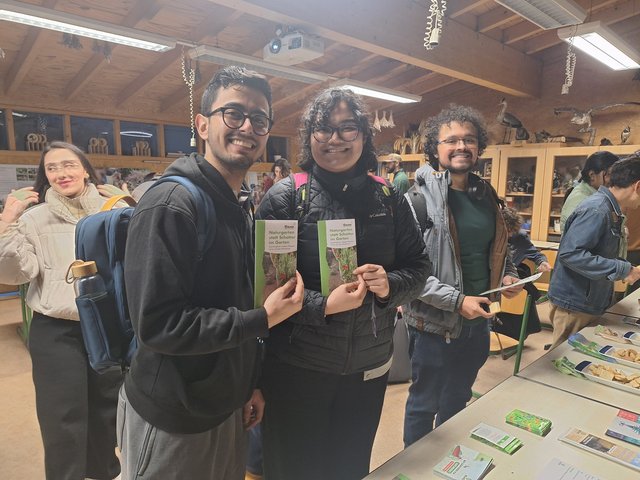 Students holding flyers