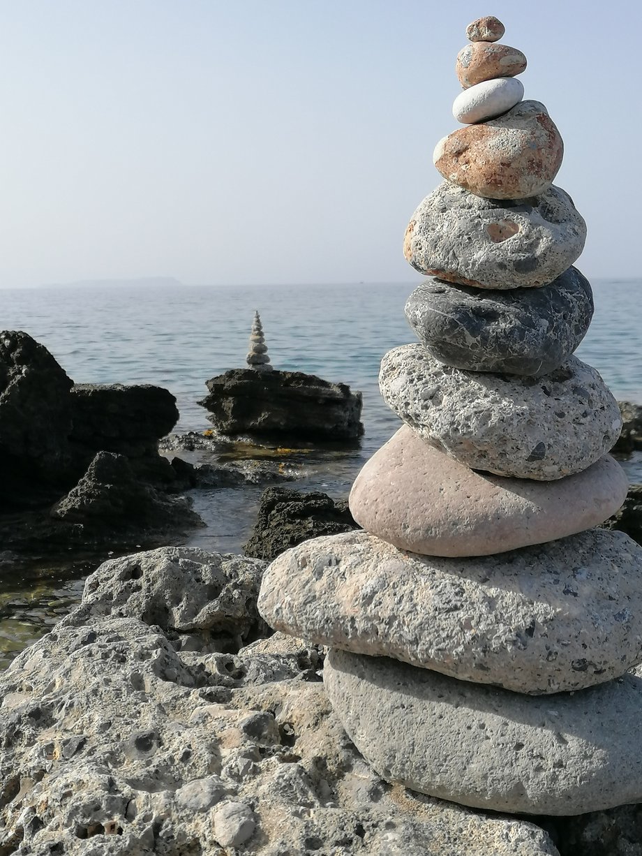 Stone towers on rocky coastline