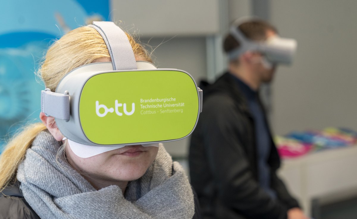 Schoolgirl with VR glasses.