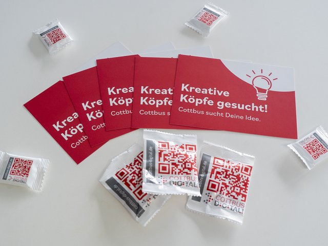 Flyer mit der Aufschrift "Kretive Köpfe gesucht!"