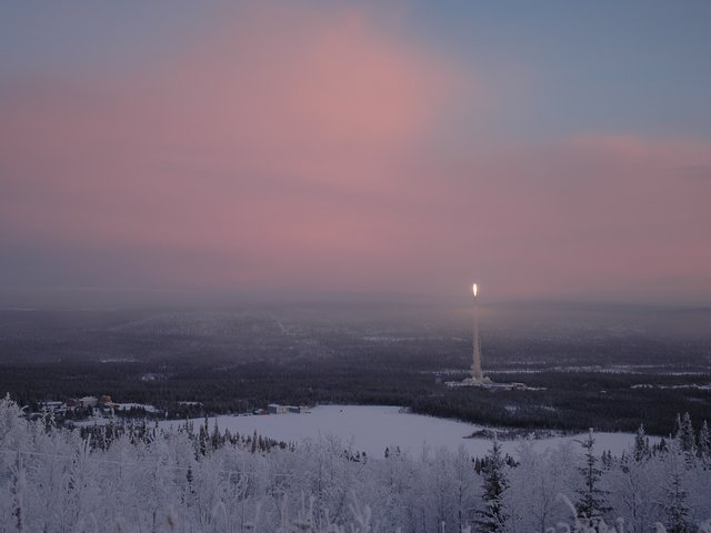 View of snowy landscape with morning glow
