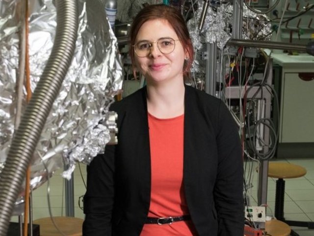 PhD student Katharina Noatschk, here standing in a physics lab, is the first MINT ambassador of BTU Cottbus-Senftenberg. 