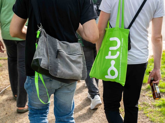 Close-up of green bag with BTU logo