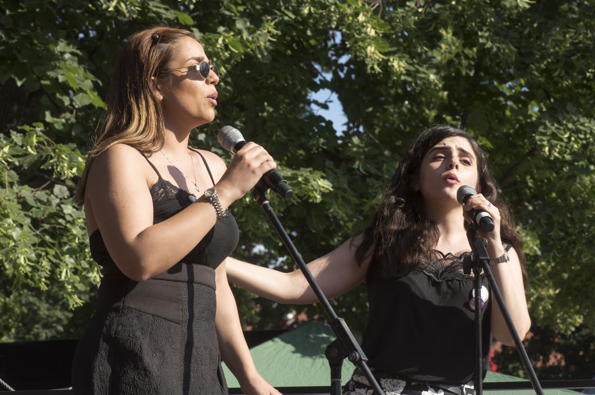 Two students during their singing contribution