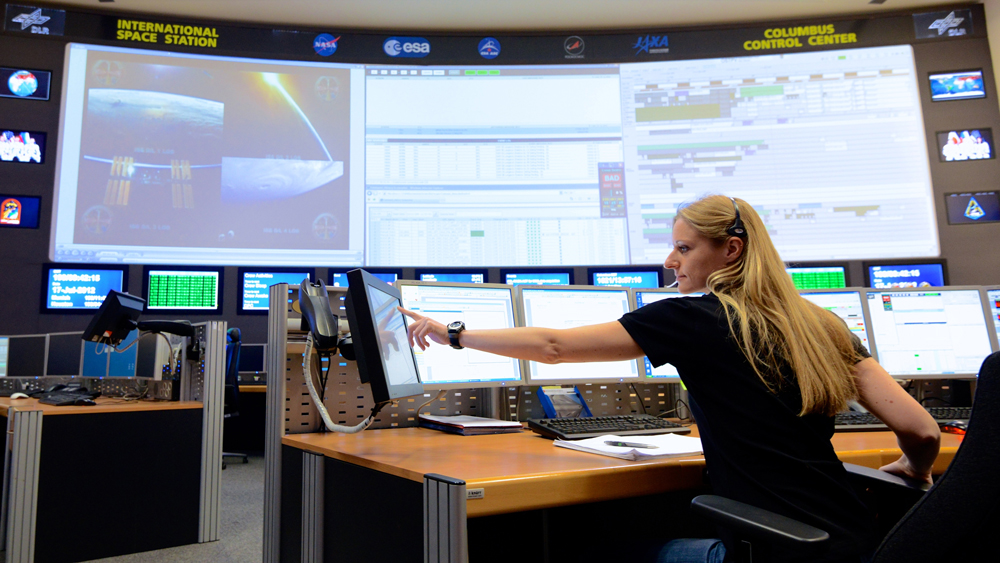 Engineer works in the Columbus control center, which is located in Oberpfaffenhofen