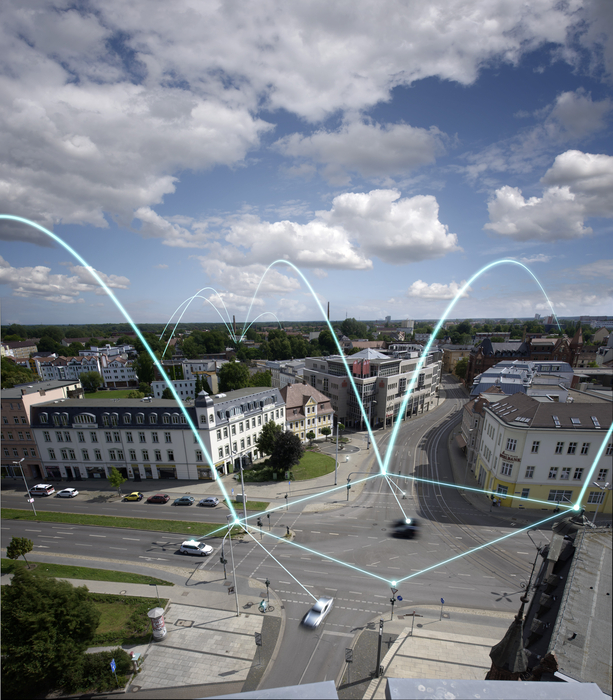 Fotomontage der Stadtansicht Cottbus mit einem digitalen Netz
