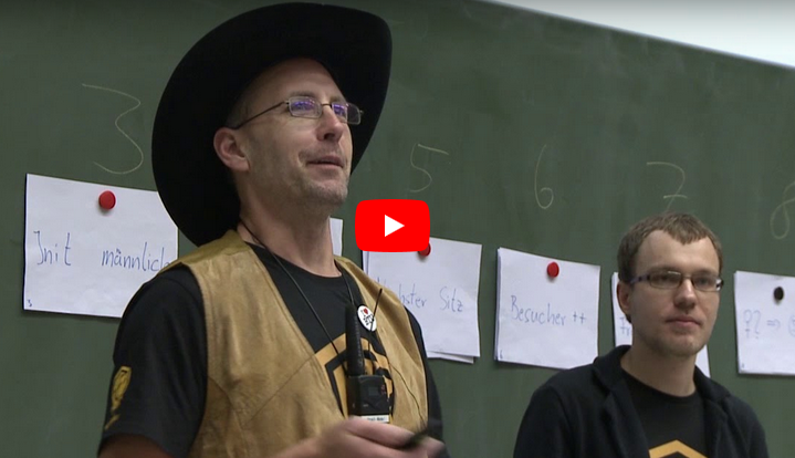Videothumbnail der Vortrags. Zu sehen Werner Haas (l.) und Thomas Prescher.
